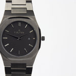Reloj gun color con 2 manecillas y dial gun color con fecha