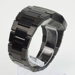 Reloj negro con 2 manecillas negras y dial negro