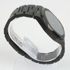 Reloj negro con 2 manecillas negras y dial negro
