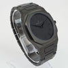 Reloj negro con 2 manecillas negras y dial negro