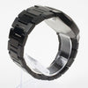 Reloj negro con 2 manecillas plateadas y dial negro con fecha