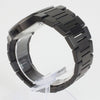 Reloj negro con 3 manecillas plateadas y dial negro con fecha