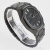 Reloj negro con 3 manecillas plateadas y dial negro con fecha