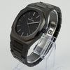 Reloj negro con 3 manecillas plateadas y dial negro