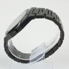 Reloj negro de 2 manecillas plateadas y dial negro