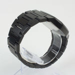 Reloj negro de 2 manecillas plateadas y dial negro