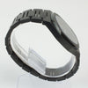 Reloj negro de 2 manecillas plateadas y dial negro