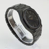 Reloj negro de 2 manecillas plateadas y dial negro