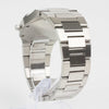 Reloj plateado con 2 manecillas y dial azul con fecha