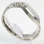 Reloj plateado con 2 manecillas y dial azul con fecha
