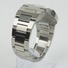 Reloj plateado con 3 manecillas y dial azul