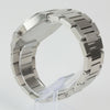 Reloj plateado con 2 manecillas y dial blanco con fecha