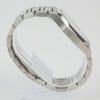 Reloj plateado con 2 manecillas y dial blanco con fecha