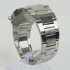 Reloj plateado con 3 manecillas y dial blanco con fecha