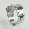 Reloj plateado con 2 manecillas y dial azul