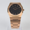 Reloj rosado con 2 manecillas y dial negro
