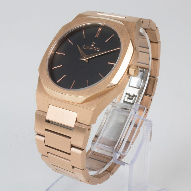 Reloj rosado con 2 manecillas y dial negro