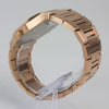 Reloj rosado con 2 manecillas y dial negro