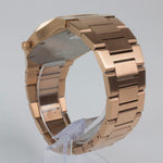 Reloj rosado con 2 manecillas y dial negro