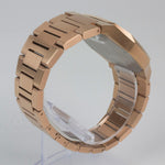 Reloj rosado con 2 manecillas y dial negro