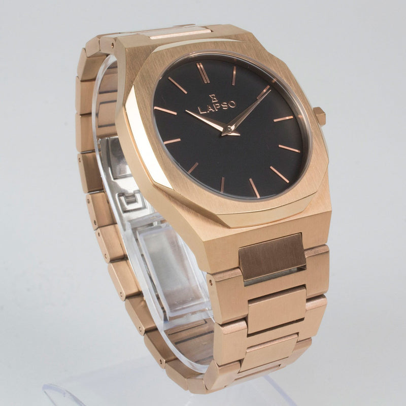 Reloj rosado con 2 manecillas y dial negro